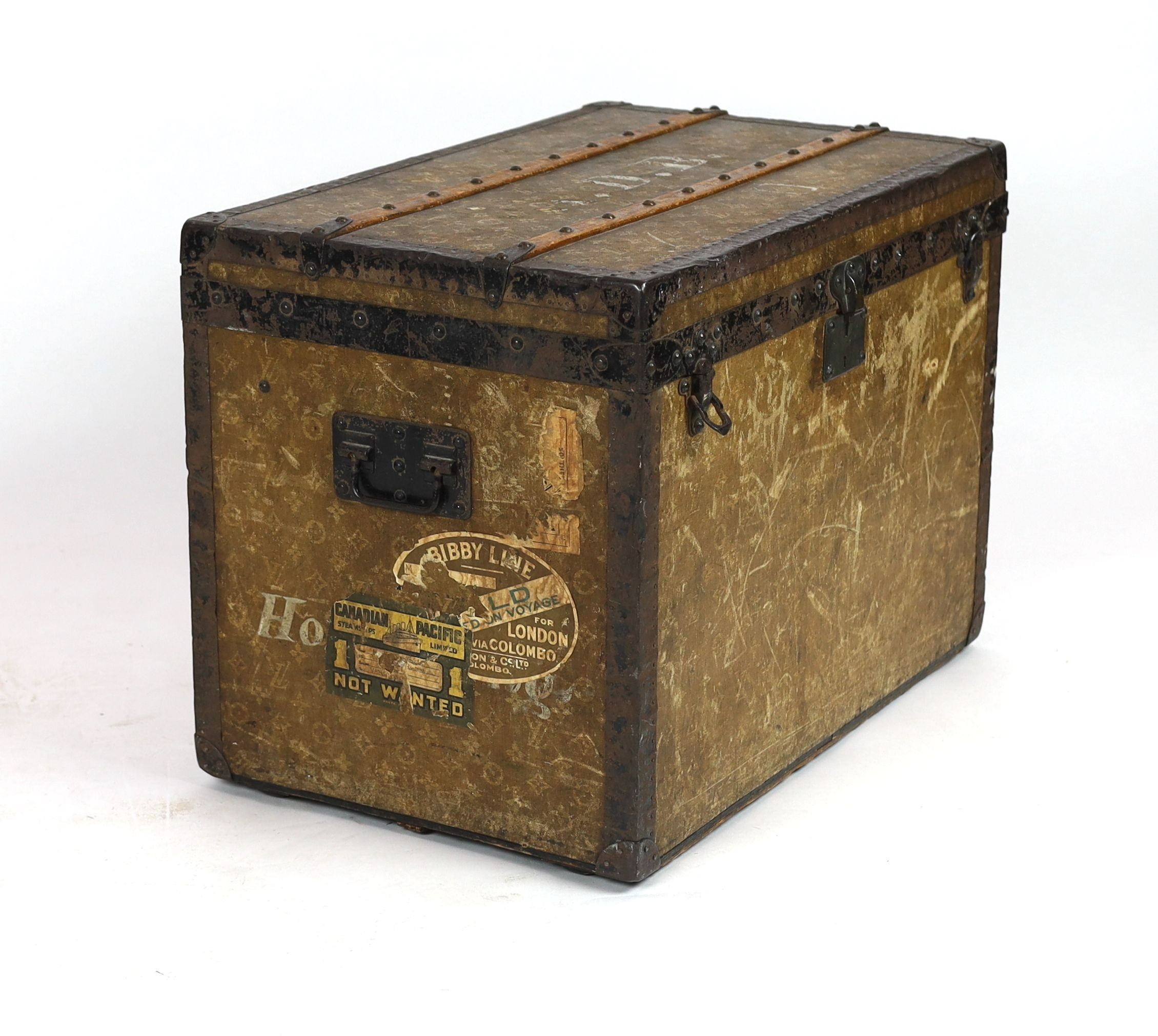 An early 20th century Louis Vuitton iron bound travelling trunk, width 76cm, depth 48cm, height 55cm